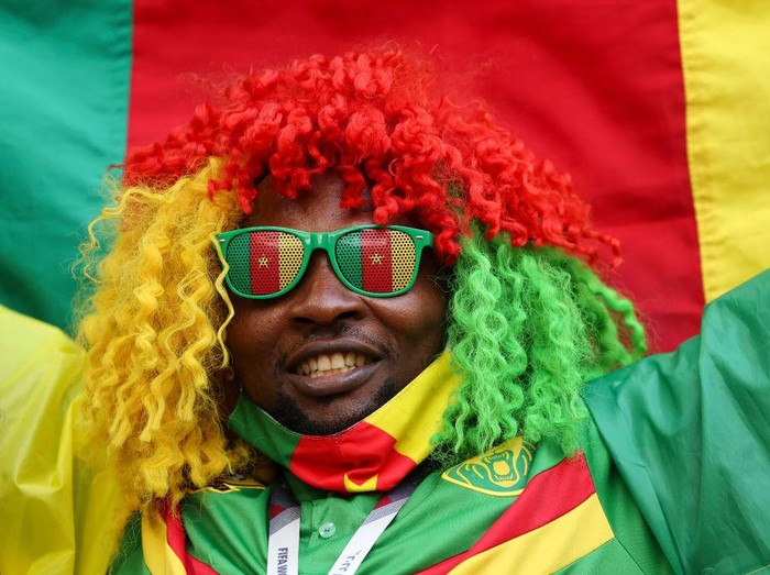 AL WAKRAH, QATAR - NOVEMBER 24: A fan of Cameroon during the FIFA World Cup Qatar 2022 Group G match between Switzerland and Cameroon at Al Janoub Stadium on November 24, 2022 in Al Wakrah, Qatar. (Photo by Matthew Ashton - AMA/Getty Images)
