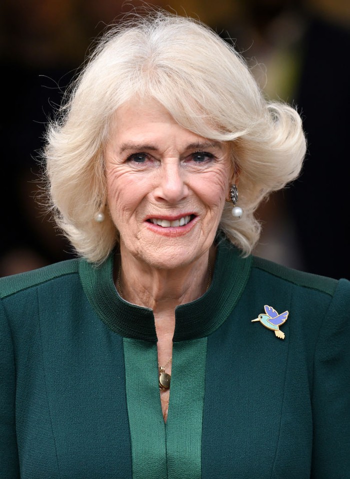 LONDON, ENGLAND - NOVEMBER 24: Camilla, Queen Consort departs Barnardo’s Nursery, Bow on November 24, 2022 in London, England. Camilla, Queen Consort will personally deliver Paddington bears and other cuddly toys that were left as tributes to Queen Elizabeth II at Royal Residences to children supported by Barnardos. (Photo by Karwai Tang/WireImage)