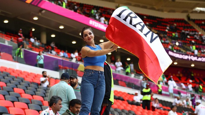 Soccer Football - FIFA World Cup Qatar 2022 - Group B - Wales v Iran - Ahmad Bin Ali Stadium, Al Rayyan, Qatar - November 25, 2022
An Iran fan is pictured inside the stadium before the match REUTERS/Dylan Martinez