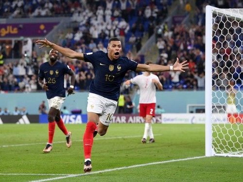 DOHA, QATAR - NOVEMBER 26: Kylian Mbappe of France celebrates after scoring their teams second goal during the FIFA World Cup Qatar 2022 Group D match between France and Denmark at Stadium 974 on November 26, 2022 in Doha, Qatar. (Photo by Stu Forster/Getty Images)