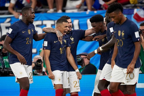 DOHA, QATAR - NOVEMBER 26:  Kylian Mbappe of France celebrates with his team mates after scoring his teams second goal during the FIFA World Cup Qatar 2022 Group D match between France and Denmark at Stadium 974 on November 26, 2022 in Doha, Qatar. (Photo by Juan Luis Diaz/Quality Sport Images/Getty Images)