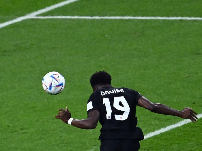 Canada's forward #19 Alphonso Davies heads the ball to score his team's first goal during the Qatar 2022 World Cup Group F football match between Croatia and Canada at the Khalifa International Stadium in Doha on November 27, 2022. (Photo by Jewel SAMAD / AFP) (Photo by JEWEL SAMAD/AFP via Getty Images)