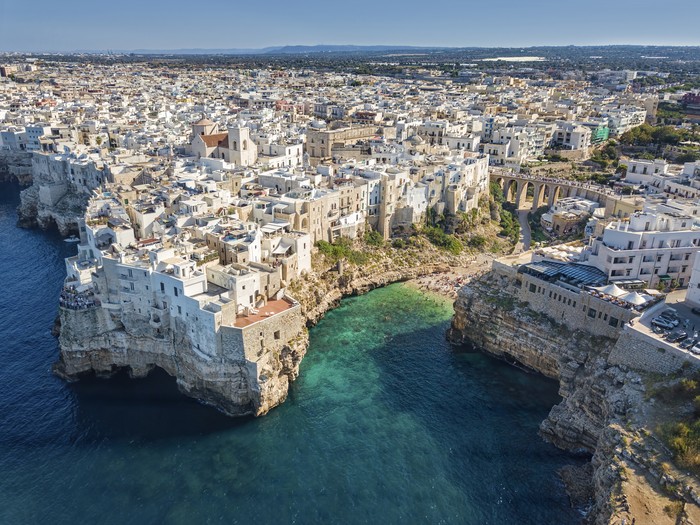 Aerial view of Polignano a Mare town and beach in Bari Province, Puglia, Italy