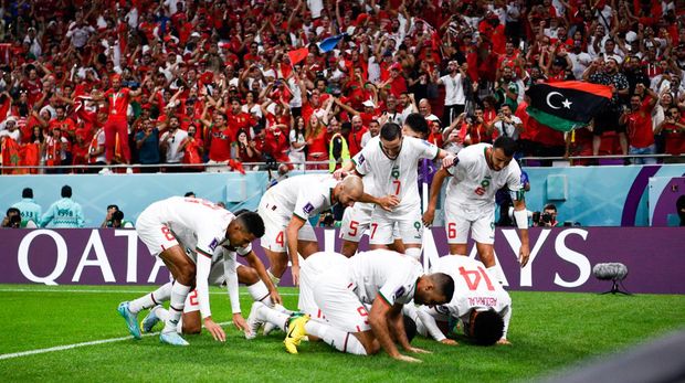 DOHA, QATAR - NOVEMBER 27: Abdelhamid Sabiri of Morocco celebrates with teammates after scoring their team's first goal during the Group F - FIFA World Cup Qatar 2022 match between Belgium and Morocco at the Al Thumama Stadium on November 27, 2022 in Doha, Qatar (Photo by Pablo Morano/BSR Agency/Getty Images)