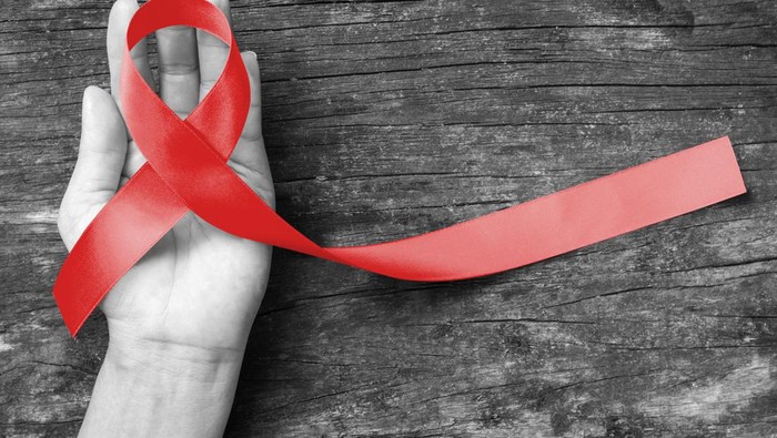 Banner with realistic red ribbon. Poster with symbol for world aids day, 1 december. Design template, vector illustration.