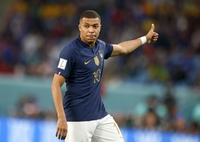 DOHA, QATAR - NOVEMBER 26: Kylian Mbappe of France celebrates as he scores the goal 2: during the FIFA World Cup Qatar 2022 Group D match between France and Denmark at Stadium 974 on November 26, 2022 in Doha, Qatar. (Photo by Stefan Matzke - sampics/Corbis via Getty Images)
