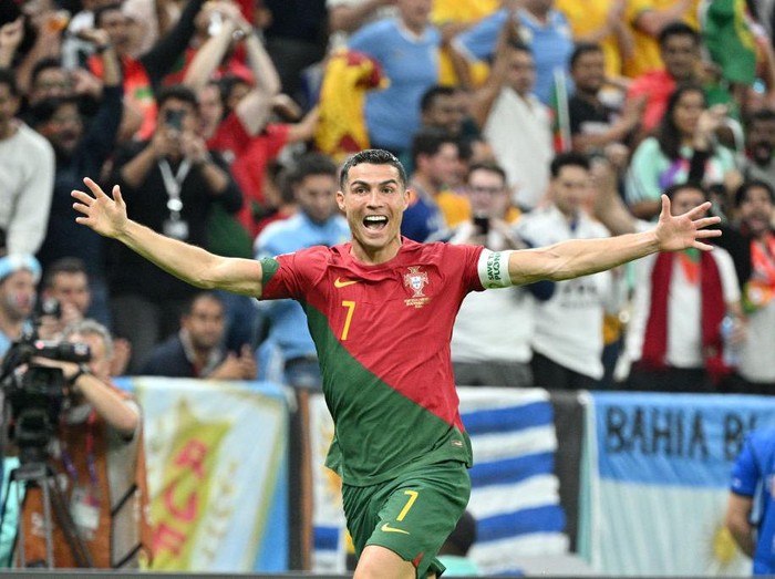 LUSAIL, QATAR - NOVEMBER 28: Cristiano Ronaldo of Portugal celebrates their first goal during the FIFA World Cup Qatar 2022 match between Portugal v Uruguay at the Lusail Stadium on November 28, 2022 in Lusail Qatar (Photo by Lionel Hahn/Getty Images)