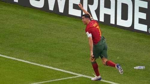 Portugals Cristiano Ronaldo celebrates scoring his sides opening goal during the World Cup group H soccer match between Portugal and Uruguay, at the Lusail Stadium in Lusail, Qatar, Monday, Nov. 28, 2022. (AP Photo/Darko Vojinovic)