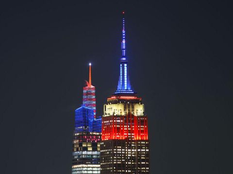 JERSEY CITY, NJ - NOVEMBER 29: The Empire State Building and One Vanderbilt celebrate the victory by the U.S. over Iran at the FIFA World Cup with lighting in red, white and blue in New York City on November 29, 2022, as seen from Jersey City, New Jersey.  (Photo by Gary Hershorn/Getty Images)