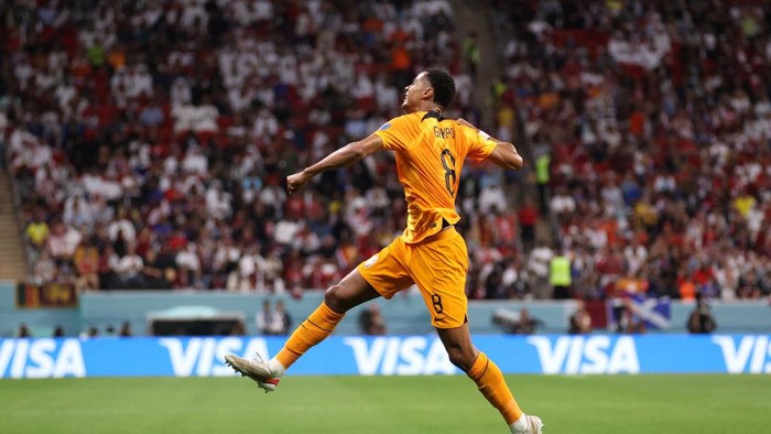 AL KHOR, QATAR - NOVEMBER 29: Cody Gakpo of Netherlands celebrates after scoring their team’s first goal during the FIFA World Cup Qatar 2022 Group A match between Netherlands and Qatar at Al Bayt Stadium on November 29, 2022 in Al Khor, Qatar. (Photo by Catherine Ivill/Getty Images)