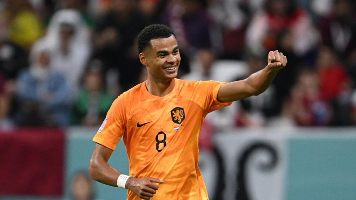 AL KHOR, QATAR - NOVEMBER 29: Cody Gakpo of Netherlands celebrates after scoring their team’s first goal during the FIFA World Cup Qatar 2022 Group A match between Netherlands and Qatar at Al Bayt Stadium on November 29, 2022 in Al Khor, Qatar. (Photo by Matthias Hangst/Getty Images)