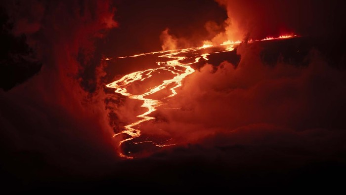 HAWAII, UNITED STATES - NOVEMBER 29: (----EDITORIAL USE ONLY - MANDATORY CREDIT - 'UNITED STATES GEOLOGICAL SURVEY / HANDOUT' - NO MARKETING NO ADVERTISING CAMPAIGNS - DISTRIBUTED AS A SERVICE TO CLIENTS----) A view from Mauna Loa, the world's largest active volcano, began to erupt overnight, prompting authorities to open shelters 