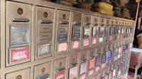 Kotak-kotak sumbangan berjumlah puluhan di Wat Prathat Doi Suthep di Chiang Mai