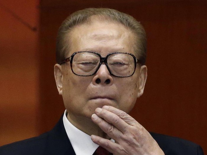 FILE - Former Chinese President Jiang Zemin watches the proceedings at the opening session of the 18th Communist Party Congress held at the Great Hall of the People in Beijing, Nov. 8, 2012. Jiang has died Wednesday, Nov. 30, 2022, at age 96. (AP Photo/Ng Han Guan, File)