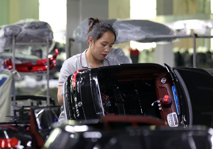 XINGTAI, CHINA - JULY 19: An employee assembles an electric toy car at a factory on July 19, 2022 in Xingtai, Hebei Province of China. (Photo by Wang Lei/VCG via Getty Images)