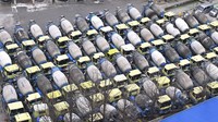 Aksi tersebut praktis mengganggu rantai pasokan di seluruh wilayah Korea Selatan, negara dengan ekonomi terbesar ke-10 di dunia. Sektor unggulan seperti pembuat mobil, industri semen, dan produsen baja terkena dampak paling serius. AP/Kim Jong-taek  
