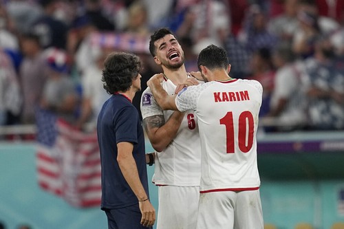 Irans Saeid Ezatolahi cries at the end of the World Cup group B soccer match between Iran and the United States at the Al Thumama Stadium in Doha, Qatar, Wednesday, Nov. 30, 2022. (AP Photo/Ebrahim Noroozi)