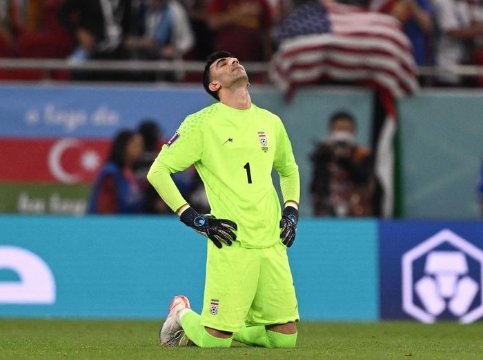 TOPSHOT - Iran's goalkeeper #01 Alireza Beiranvand reacts at the end of the Qatar 2022 World Cup Group B football match between Iran and USA at the Al-Thumama Stadium in Doha on November 29, 2022. (Photo by Fabrice COFFRINI / AFP) (Photo by FABRICE COFFRINI/AFP via Getty Images)