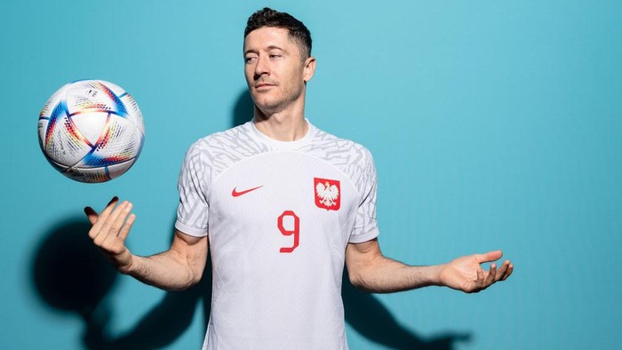 DOHA, QATAR - NOVEMBER 18: Robert Lewandowski of Poland poses during the official FIFA World Cup Qatar 2022 portrait session on November 18, 2022 in Doha, Qatar. (Photo by Dan Mullan - FIFA/FIFA via Getty Images)