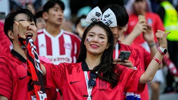 Fans Korea Selatan tampi bergaya. Foto: Getty Images