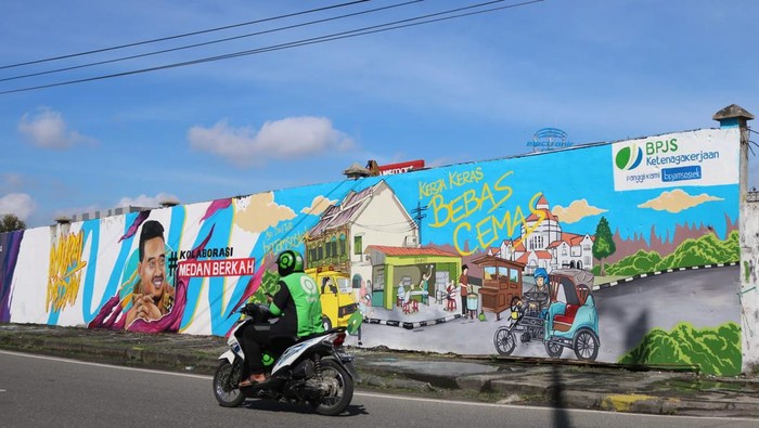Lukisan mural berisi kampanye jaminan sosial (Foto: Istimewa)