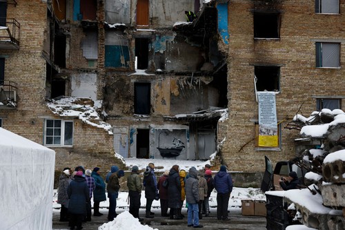 HORENKA, UKRAINE - NOVEMBER 22: A view from Lidiya Panchyshyna, 45 destroyed apartment building where graffiti artist Banksy has made a picture on November 22, 2022 in Horenka, Ukraine. The elusive British artist posted a video to Instagram last week that suggested he's behind the spray-painted artworks that have appeared across the Ukrainian capital this month. (Photo by Jeff J Mitchell/Getty Images)