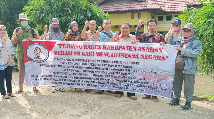 Nakes Asahan yang melakukan aksi jalan kaki ke Istana Negara (Foto: Istimewa)