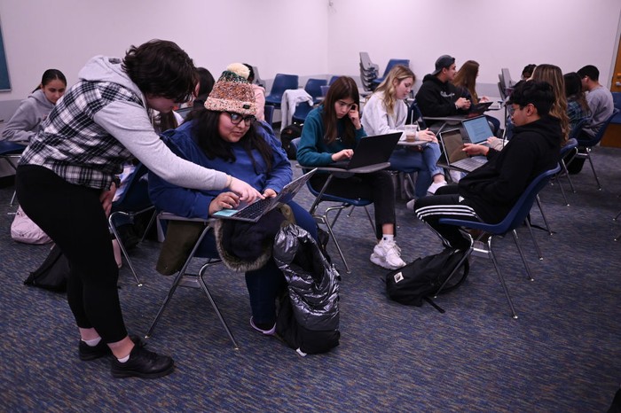 1245290086 GREELEY, CO - DECEMBER 1 : Jasmin Mazariegos, 18, center, and her groups are discussing about a project during University 101 class at University of Northern Colorado in Greeley, Colorado on Thursday, December 1, 2022. University 101 class that has for the last seven years tried to help students acclimate to college. The college's goal to get students a full college experience is more difficult than ever because students are less social, less communicative, have fewer test taking and study skills, and are more easily overwhelmed. (Photo by Hyoung Chang/The Denver Post)