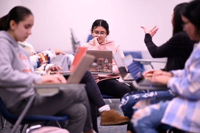 1245290086 GREELEY, CO - DECEMBER 1 : Jasmin Mazariegos, 18, center, and her groups are discussing about a project during University 101 class at University of Northern Colorado in Greeley, Colorado on Thursday, December 1, 2022. University 101 class that has for the last seven years tried to help students acclimate to college. The college's goal to get students a full college experience is more difficult than ever because students are less social, less communicative, have fewer test taking and study skills, and are more easily overwhelmed. (Photo by Hyoung Chang/The Denver Post)