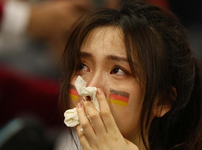 Soccer Football - FIFA World Cup Qatar 2022 - Group E - Costa Rica v Germany - Al Bayt Stadium, Al Khor, Qatar - December 2, 2022
A Germany fan looks dejected after the match as Germany are eliminated from the World Cup REUTERS/Wolfgang Rattay