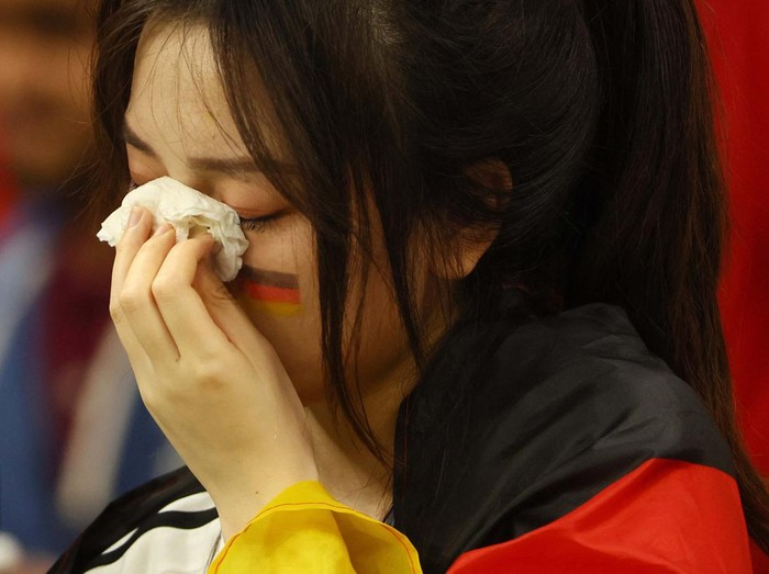 Soccer Football - FIFA World Cup Qatar 2022 - Group E - Costa Rica v Germany - Al Bayt Stadium, Al Khor, Qatar - December 2, 2022
A Germany fan looks dejected after the match as Germany are eliminated from the World Cup REUTERS/Wolfgang Rattay