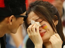 Seorang penggemar Jerman terlihat sedih setelah pertandingan karena Jerman tersingkir dari Piala Dunia 2022.