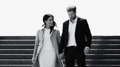 This image released by Netflix shows Prince Harry and Meghan, Duke and Duchess of Sussex, in a scene from the upcoming documentary Harry & Meghan, directed by Liz Garbus. (Netflix via AP)