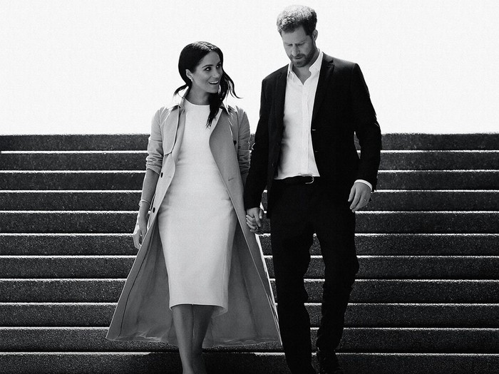 This image released by Netflix shows Prince Harry and Meghan, Duke and Duchess of Sussex, in a scene from the upcoming documentary Harry & Meghan, directed by Liz Garbus. (Netflix via AP)