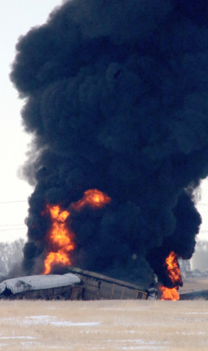 A view shows flames and smoke after a train derailment in Macoun, Saskatchewan, Canada, December 1, 2022, in this picture obtained from social media. David Grass/via REUTERS  THIS IMAGE HAS BEEN SUPPLIED BY A THIRD PARTY. MANDATORY CREDIT. NO RESALES. NO ARCHIVES.