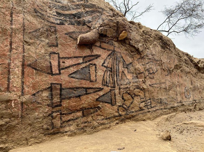 An undated picture shows an archeologist uncovering a pre-Hispanic wall painting with mythological scenes uncovered near the Lambayeque town of Illimo in northern Peru, after decades it was considered lost by archaeologists. - A team of archaeologists led by Swiss Sam Ghavanmi found a 1,000-year-old mural, known as the Huaca Pintada, which had been lost in 1916 after tomb raiders and treasure hunters discovered it. (Photo by Sam Ghavami / AFP) (Photo by SAM GHAVAMI/AFP via Getty Images)