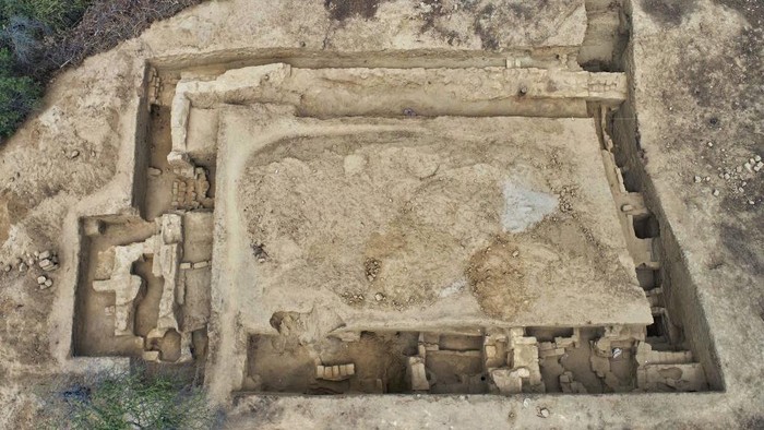 An undated picture shows an archeologist uncovering a pre-Hispanic wall painting with mythological scenes uncovered near the Lambayeque town of Illimo in northern Peru, after decades it was considered lost by archaeologists. - A team of archaeologists led by Swiss Sam Ghavanmi found a 1,000-year-old mural, known as the 