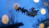 Nahh, Santa di Jerman baru nih pakai kereta rusa. (Frank Rumpenhorst/Getty Images)