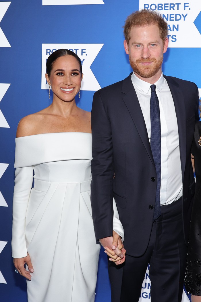 NEW YORK, NEW YORK - DECEMBER 06: Meghan, Duchess of Sussex and Prince Harry, Duke of Sussex speak onstage at the 2022 Robert F. Kennedy Human Rights Ripple of Hope Gala at New York Hilton on December 06, 2022 in New York City. (Photo by Mike Coppola/Getty Images for 2022 Robert F. Kennedy Human Rights Ripple of Hope Gala)