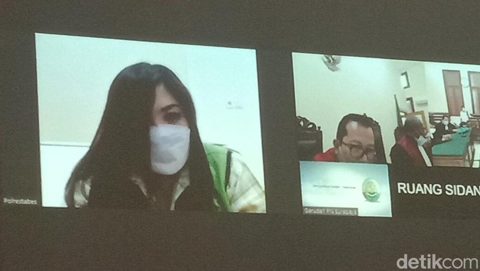 sidang penipuan voucher hotel