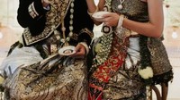 Menikmati secangkir teh manis hangat, keduanya tampil cantik dan tampan di acara resepsi pernikahan mereka. Foto: Instagram