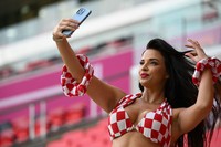 Croatian influencer and football supporter Ivana Knoll  takes a picture ahead of the Qatar 2022 World Cup Group F football match between Croatia and Belgium at the Ahmad Bin Ali Stadium in Al-Rayyan, west of Doha on December 1, 2022. (Photo by OZAN KOSE / AFP) (Photo by OZAN KOSE/AFP via Getty Images)