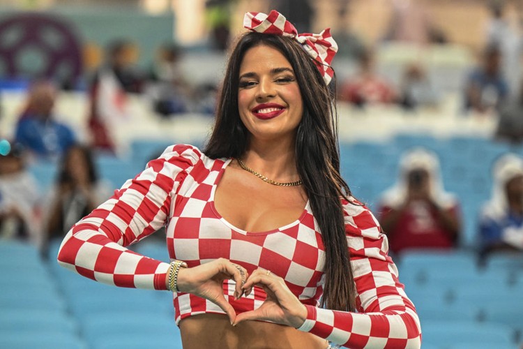 Ivana Knoll 05 December 2022, Qatar, Al-Wakra: Soccer, World Cup, Japan - Croatia, final round, round of 16, Al-Janub Stadium, Ivana Knöll, a model from Croatia, poses in the stands before the match. Photo: Robert Michael/dpa (Photo by Robert Michael/picture alliance via Getty Images)