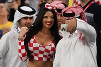 05 December 2022, Qatar, Al-Wakra: Soccer, World Cup, Japan - Croatia, final round, round of 16, Al-Janub Stadium, Ivana Knöll, a model from Croatia, poses in the stands before the match. Photo: Robert Michael/dpa (Photo by Robert Michael/picture alliance via Getty Images)