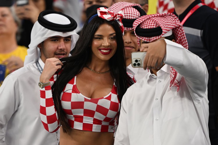 Ivana Knoll 05 December 2022, Qatar, Al-Wakra: Soccer, World Cup, Japan - Croatia, final round, round of 16, Al-Janub Stadium, Ivana Knöll, a model from Croatia, poses in the stands before the match. Photo: Robert Michael/dpa (Photo by Robert Michael/picture alliance via Getty Images)