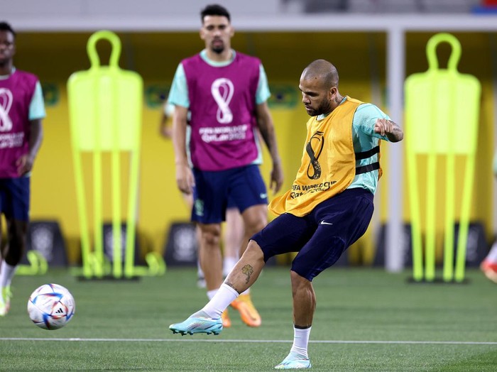 DOHA, QATAR - DECEMBER 08: Dany Alves of Brazil plays the ball during a training session on match day -1 at Al Arabi SC Stadium on December 08, 2022 in Doha, Qatar. (Photo by Alexander Hassenstein/Getty Images)