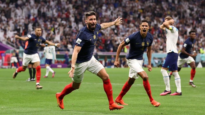AL KHOR, QATAR - DECEMBER 10: Olivier Giroud of France celebrates after scoring the teams second goal during the FIFA World Cup Qatar 2022 quarter final match between England and France at Al Bayt Stadium on December 10, 2022 in Al Khor, Qatar. (Photo by Catherine Ivill/Getty Images)