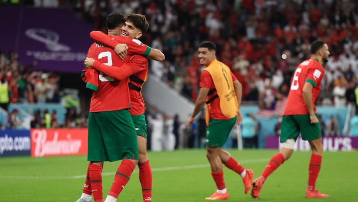 DOHA, QATAR - DECEMBER 10: Achraf Hakimi and Abde Ez of Morocco celebrate the teams 1-0 victory in the FIFA World Cup Qatar 2022 quarter final match between Morocco and Portugal at Al Thumama Stadium on December 10, 2022 in Doha, Qatar. (Photo by Buda Mendes/Getty Images)