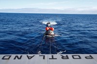AT SEA, PACIFIC OCEAN - DECEMBER 11: U.S. Navy divers secure NASAs Orion Capsule during recovery operations after it splashed down following a successful uncrewed Artemis I moon mission on December 11, 2022 seen from aboard the U.S.S. Portland in the Pacific Ocean off the coast of Baja California, Mexico. A 26-day mission took the Orion spacecraft to the moon and back which completed a historic test flight that coincided with the 50th anniversary of the landing of Apollo 17 on the moon, the last time that NASA astronauts walked there. (Pool photo by Mario Tama/Getty Images)
