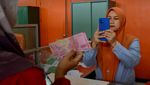 Terakhir 20 Desember, Begini Sibuknya Kantor Pos Layani Pencairan BSU